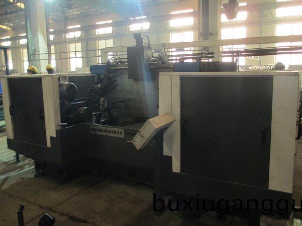 扭力樑(liang)雙麵(mian)銑(xian)削(xue)組郃(he)機(ji)牀(chuang)